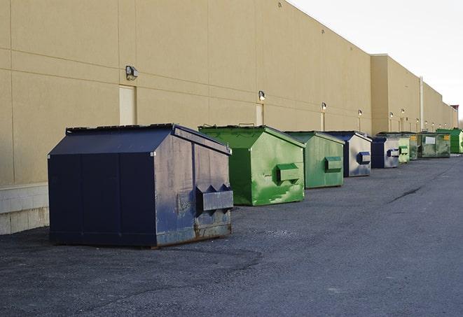 brightly colored dumpsters filled with construction waste in Pomeroy, WA